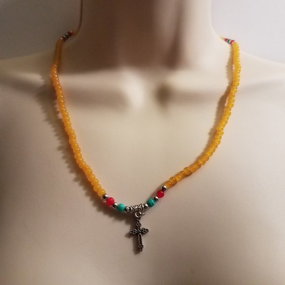 Yellow stretchy bracelet with cross charm - Picture 3 of 5